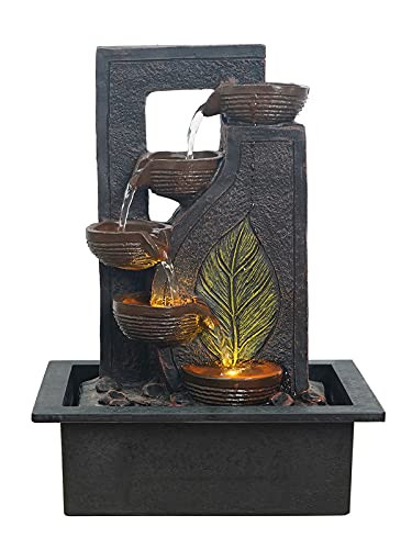 TA Add traditional elegance to your space with this 4-diya steps and golden leaf design polyresin tabletop fountain. Features built-in LED lights and an adjustable water flow pump.