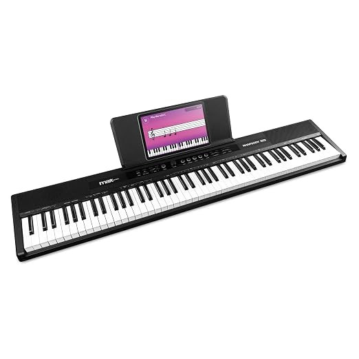 MAX Rhapsody DP88 Piano Digital Keyboard 88 Touch-Sensitive Keys, Stereo Speakers, 10 Sounds, Rhythms, 26 Demo Songs, Effects, USB/Midi Connection, Designed & Engineered in Netherlands.
